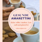 Espresso mit kleinem Amarettini auf weißer Untertasse