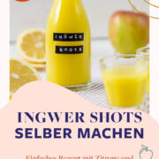 Ingwer Shot Bügelflasche, zwei Ingwer Shot Gläser, Apfel, Zitrone und Ingwer.